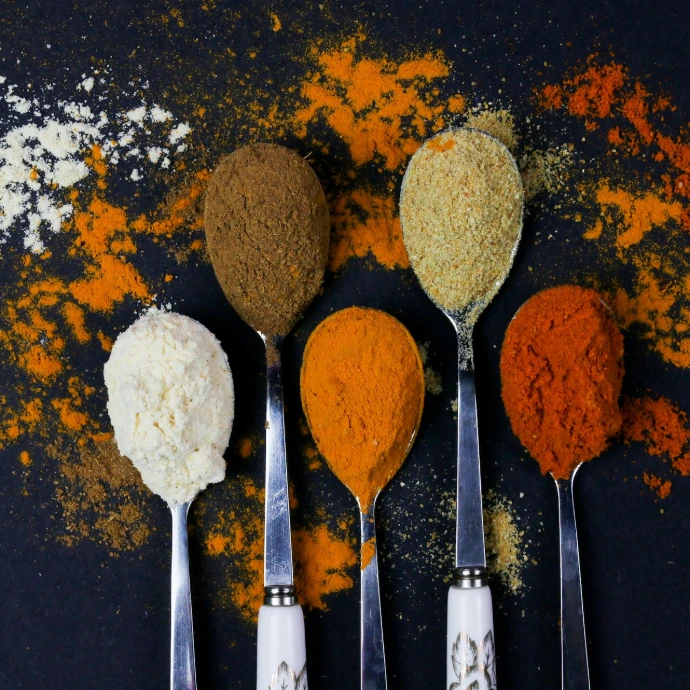 brown powder on silver spoon